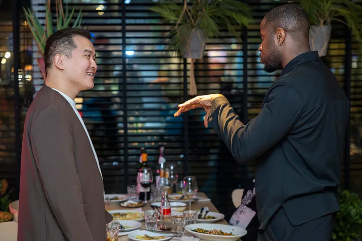 Colleagues talking at a team meetup
